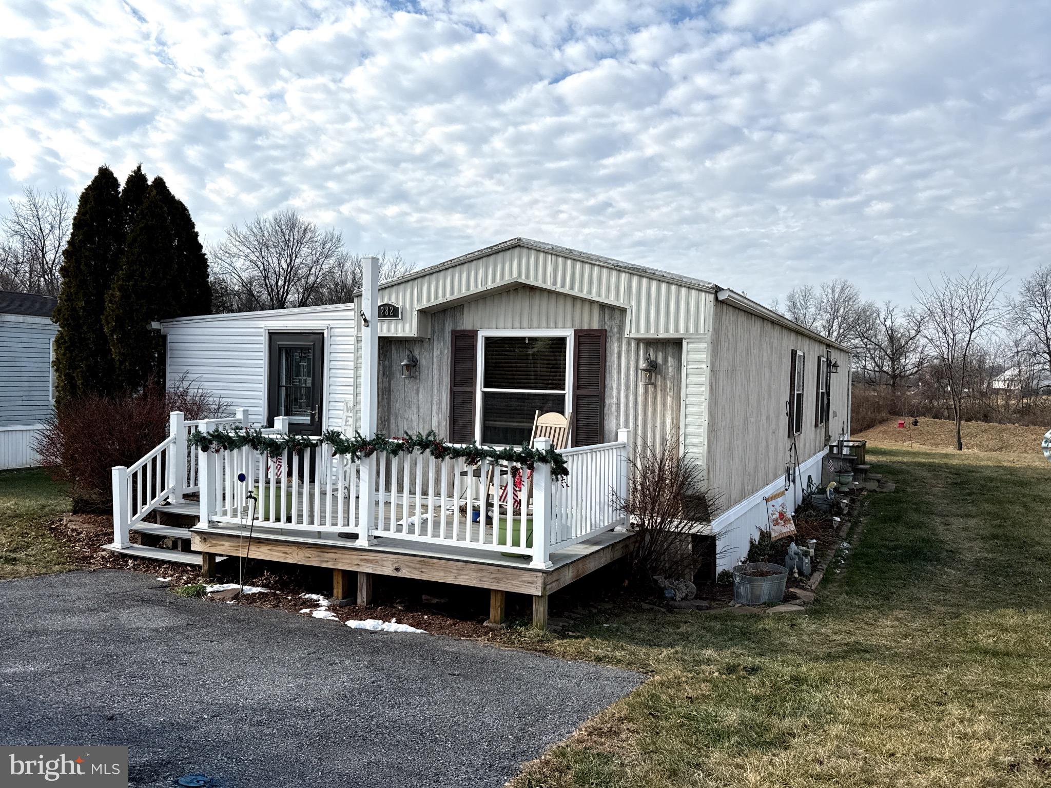 282 Michael Street Elizabethtown, PA 17022 - Photo 1 of 19 a view of a house with a yard and wooden fence