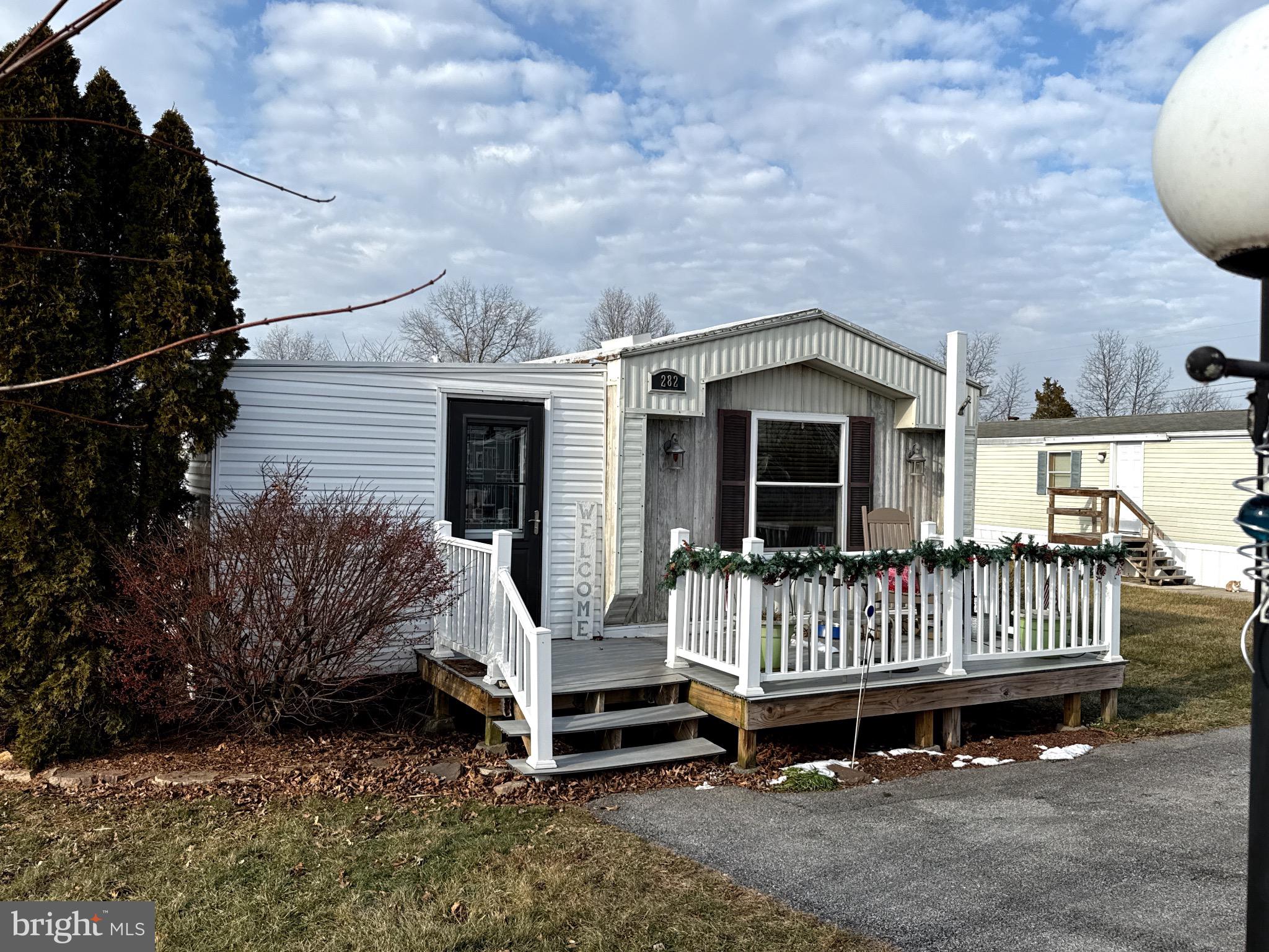 282 Michael Street Elizabethtown, PA 17022 - Photo 3 of 20 a front view of a house with a yard