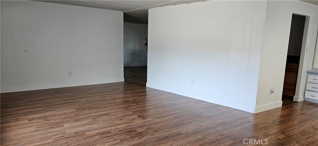 2920 Clark Road, Unit C12 Oroville, CA 95965 - Photo 7 of 17 a view of an empty room with wooden floor