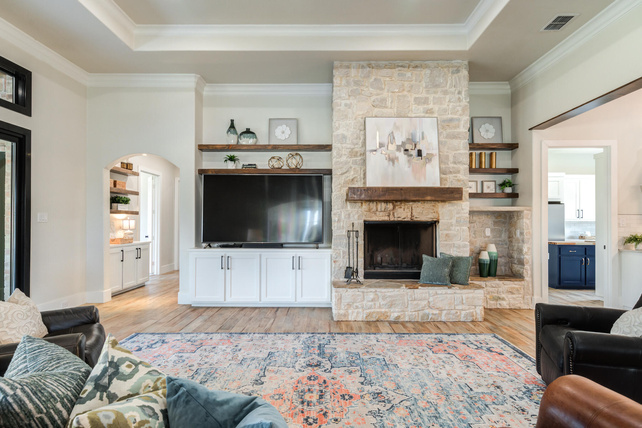 4801 118th Street Lubbock, TX 79424 - Photo 16 of 74 a living room with furniture and a fireplace