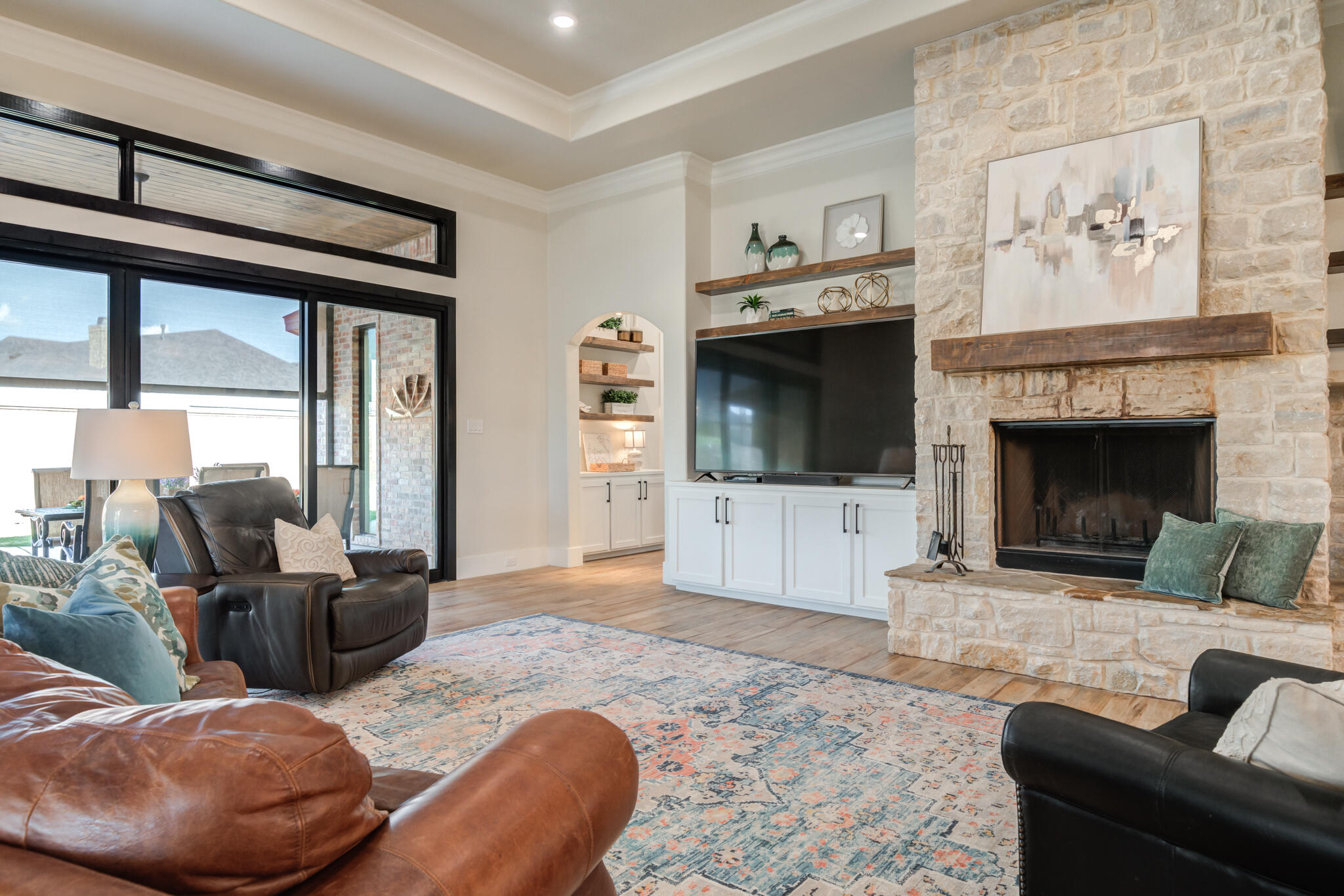 4801 118th Street Lubbock, TX 79424 - Photo 18 of 74 a living room with furniture and a fireplace