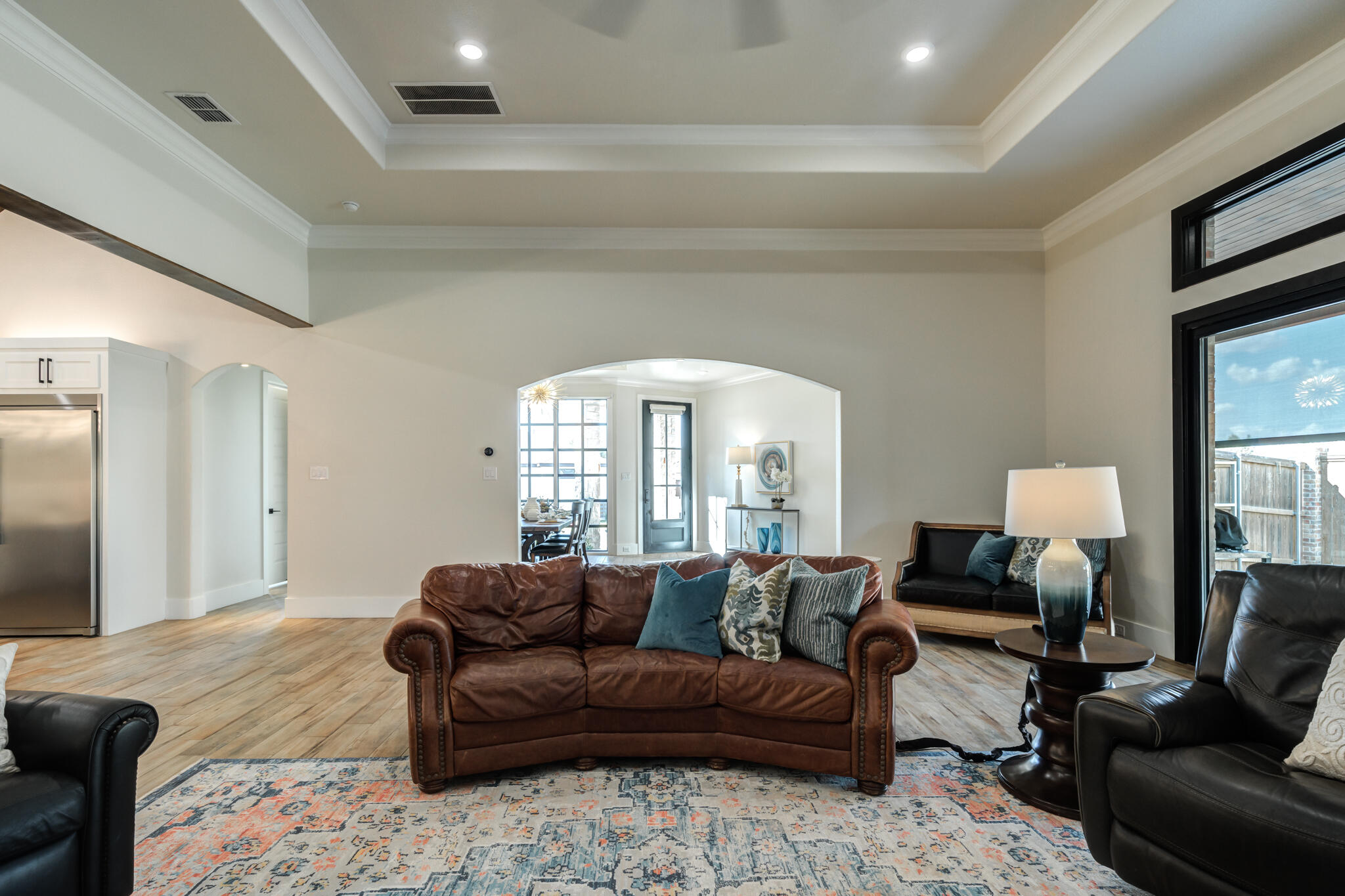 4801 118th Street Lubbock, TX 79424 - Photo 21 of 74 a living room with furniture and a large window