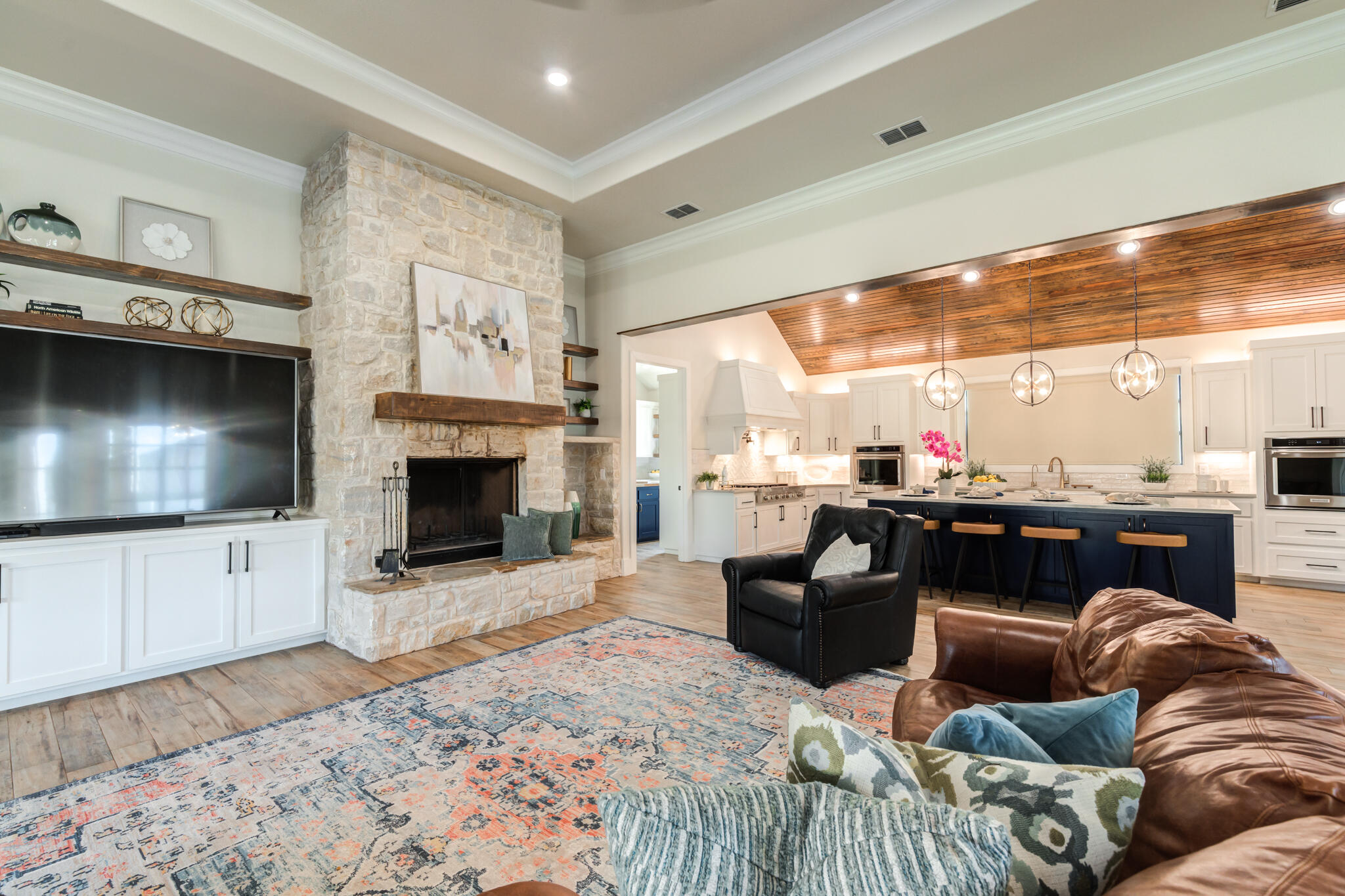 4801 118th Street Lubbock, TX 79424 - Photo 23 of 74 a living room with furniture and a flat screen tv