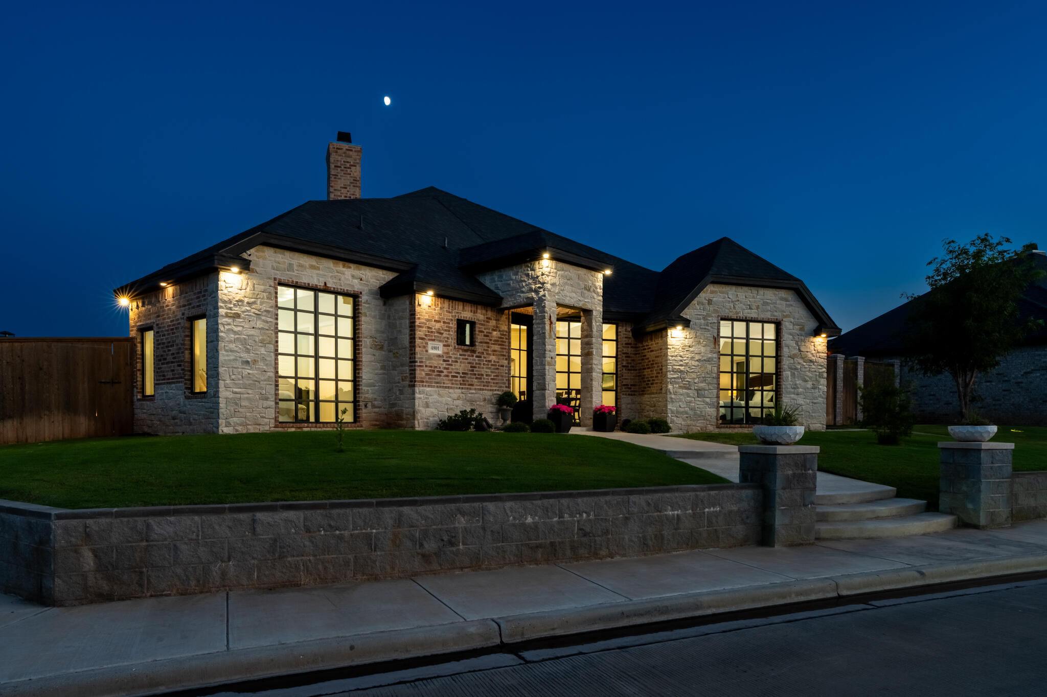 4801 118th Street Lubbock, TX 79424 - Photo 3 of 74 a front view of a house with a yard