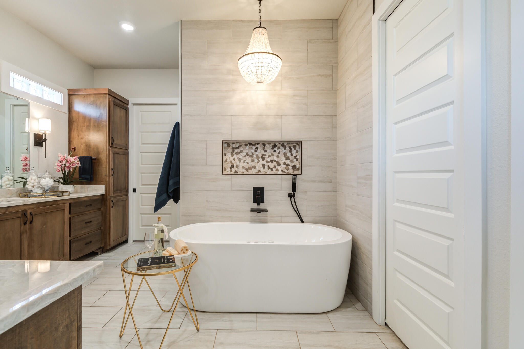 4801 118th Street Lubbock, TX 79424 - Photo 41 of 74 a white bath tub sitting in a bathroom