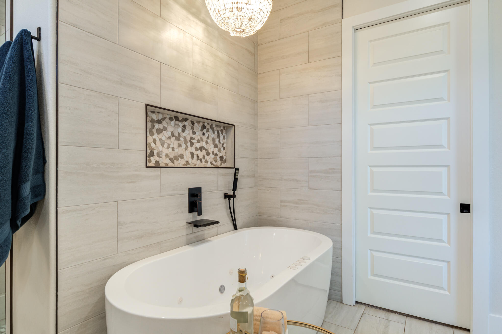 4801 118th Street Lubbock, TX 79424 - Photo 42 of 74 a bathroom with a white bath tub