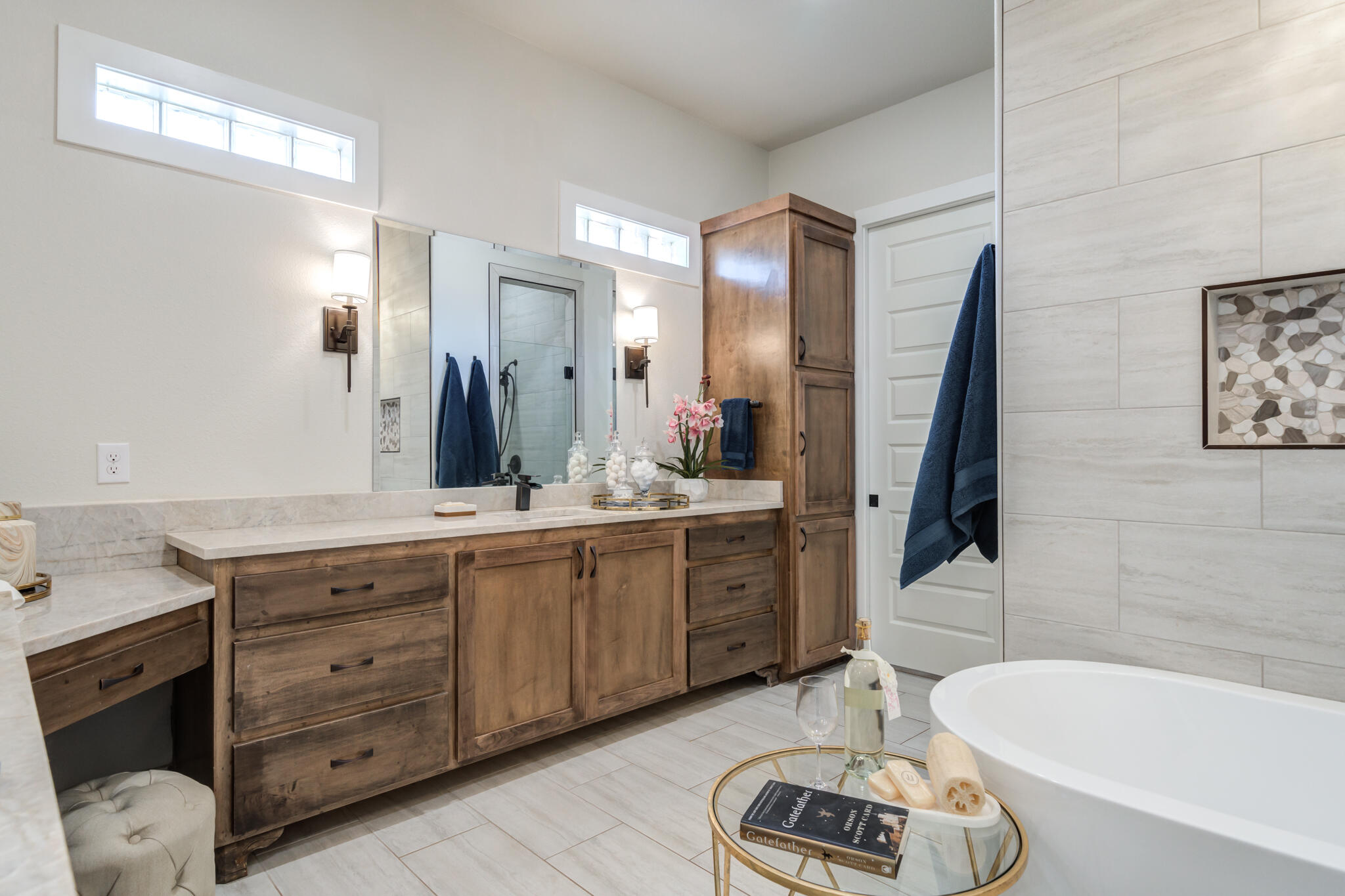 4801 118th Street Lubbock, TX 79424 - Photo 43 of 74 a bathroom with a tub sink and mirror