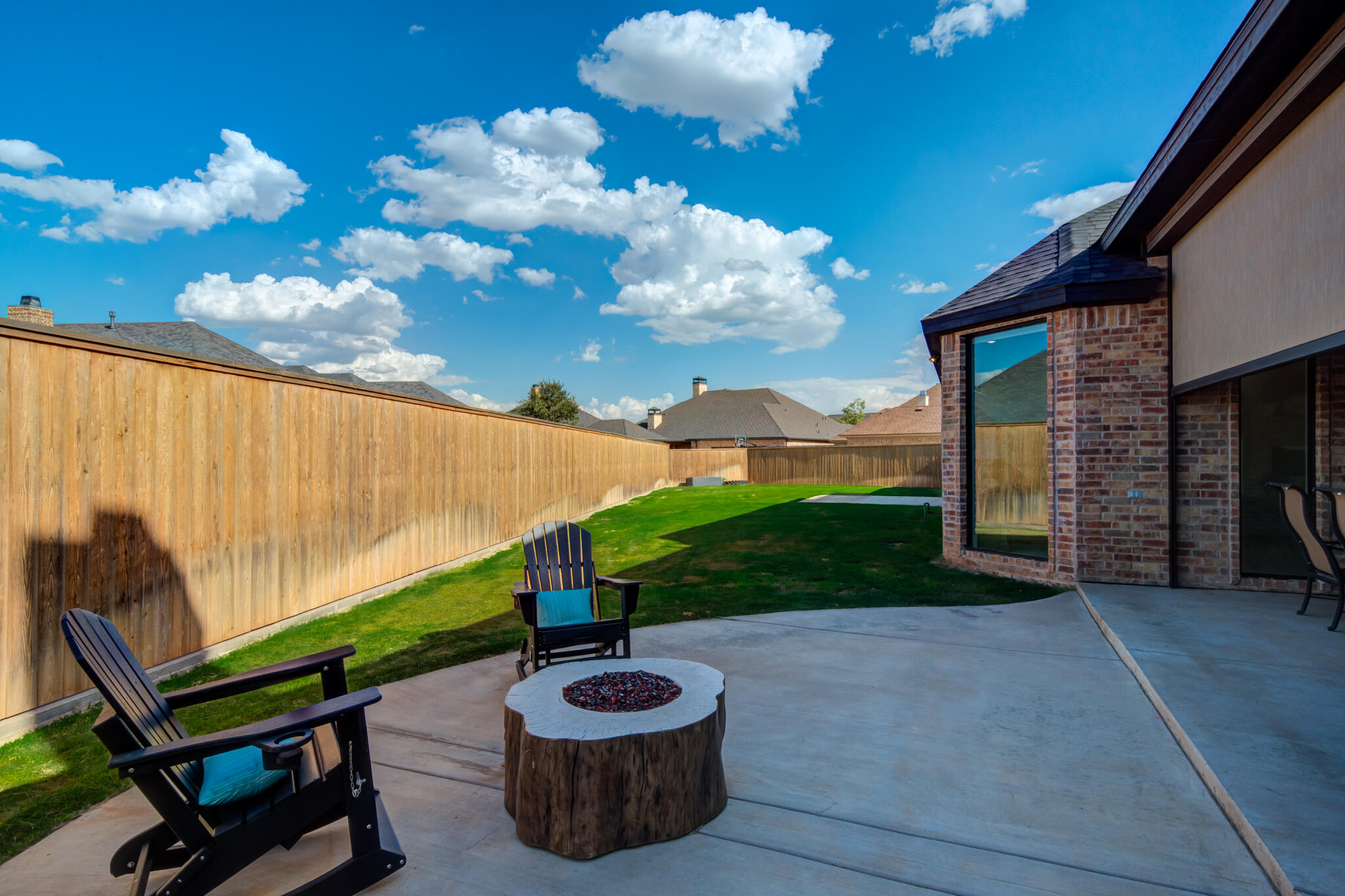 4801 118th Street Lubbock, TX 79424 - Photo 72 of 74 a view of a backyard with sitting area