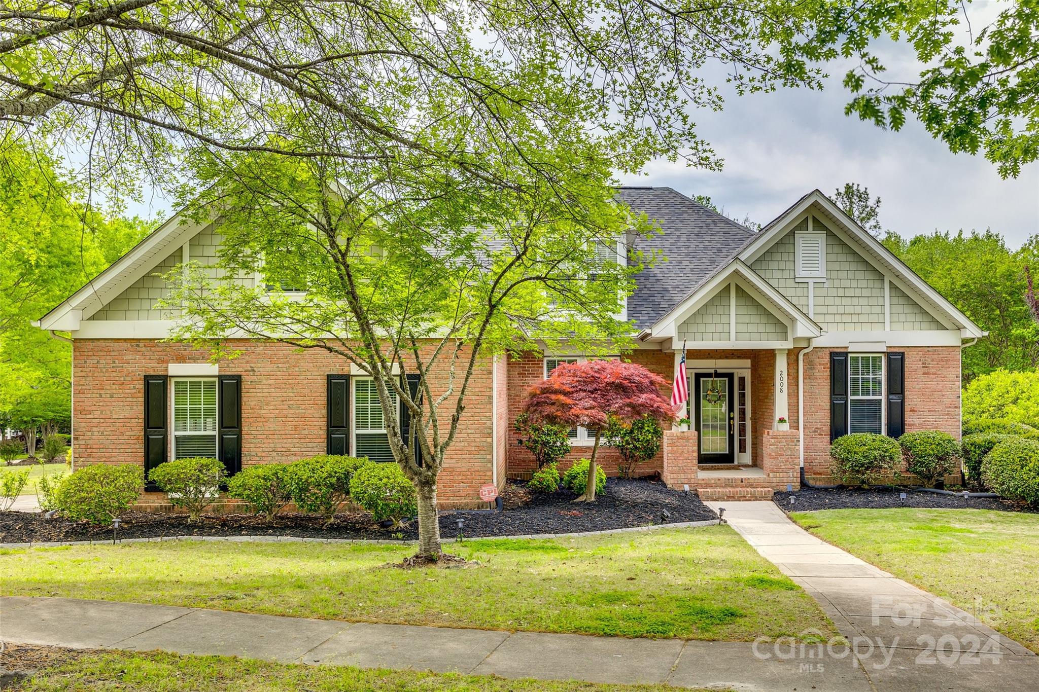 2008 Emerald Pines Drive Tega Cay, SC 29708 - Photo 1 of 48 a front view of a house with a yard