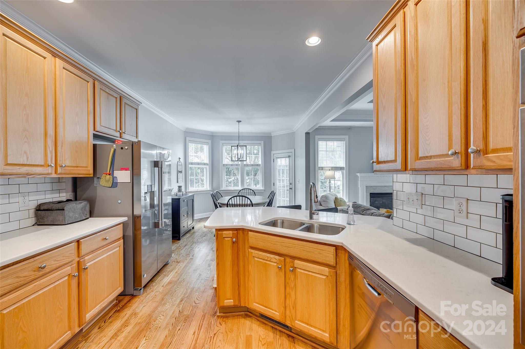 2008 Emerald Pines Drive Tega Cay, SC 29708 - Photo 11 of 48 a kitchen with stainless steel appliances granite countertop sink stove and refrigerator