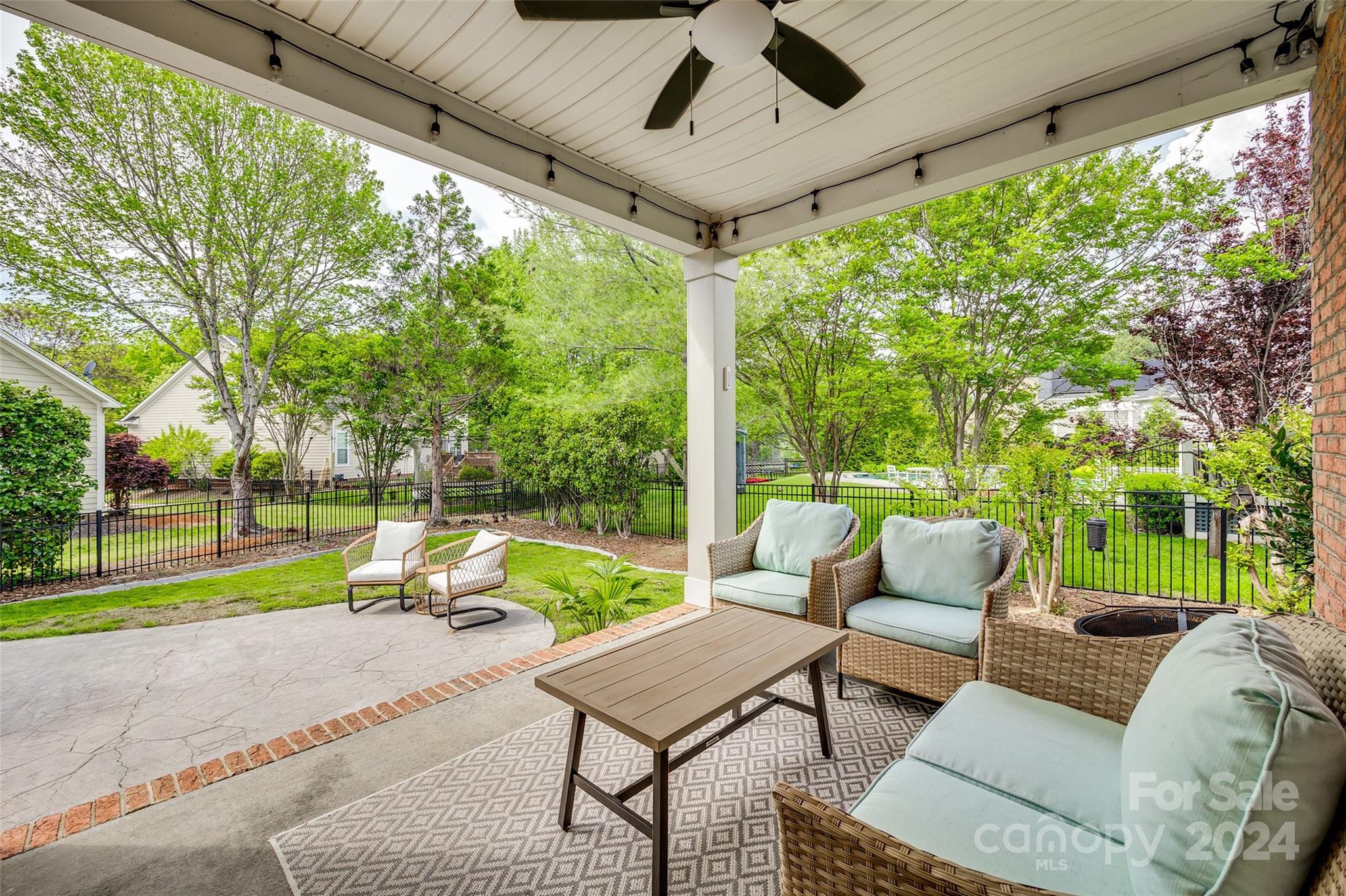 2008 Emerald Pines Drive Tega Cay, SC 29708 - Photo 27 of 48 a view of swimming pool with lawn chairs and couches with wooden floor