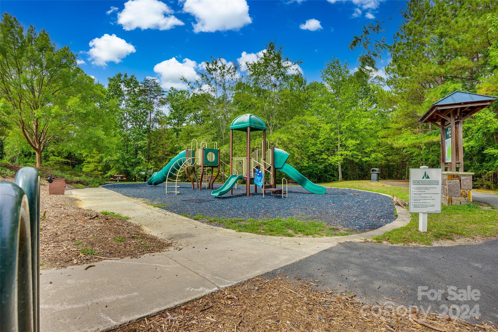 2008 Emerald Pines Drive Tega Cay, SC 29708 - Photo 44 of 48 a view of a playground with basketball court