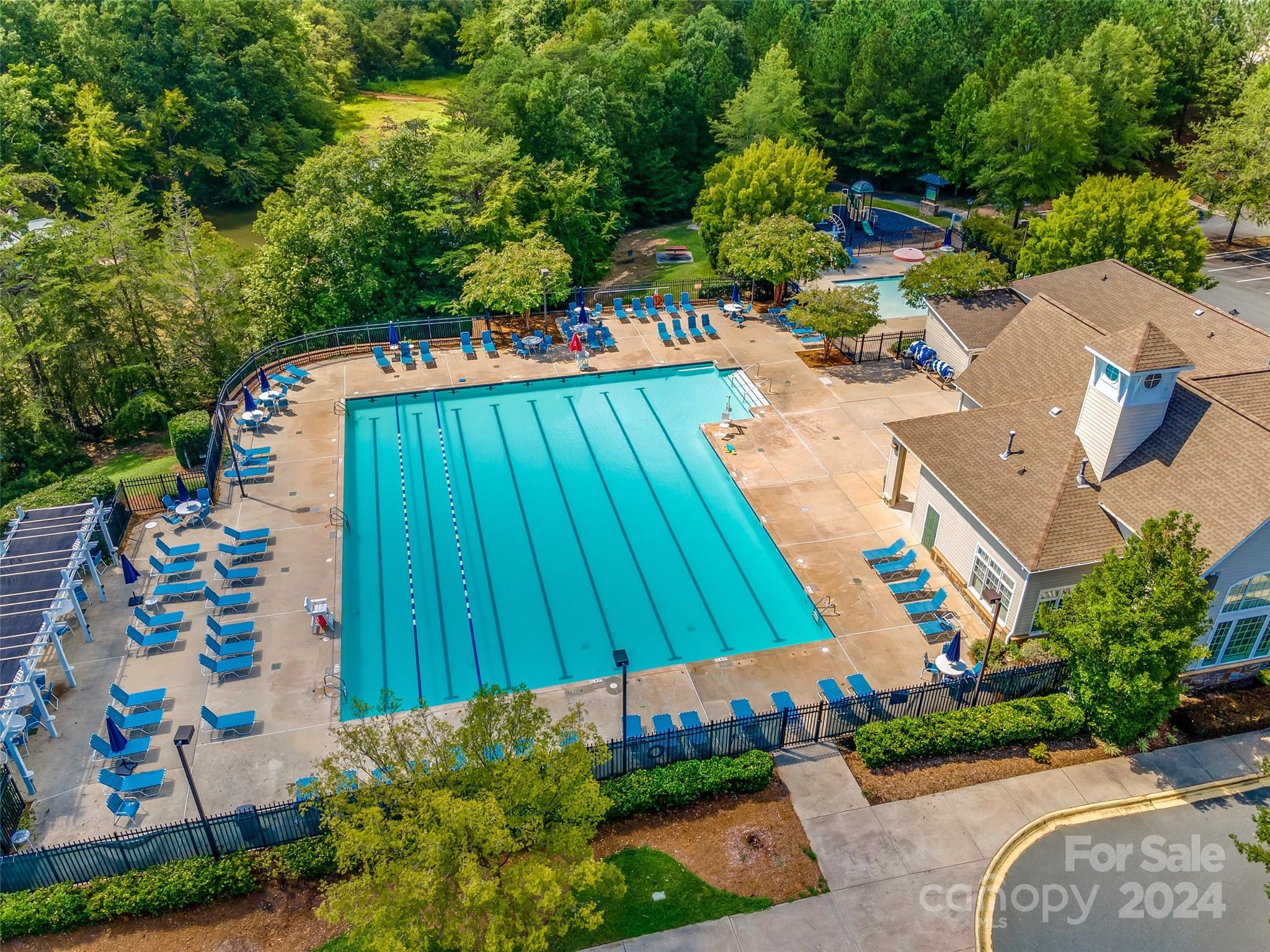 2008 Emerald Pines Drive Tega Cay, SC 29708 - Photo 46 of 48 an aerial view of a house with a yard basket ball court and outdoor seating