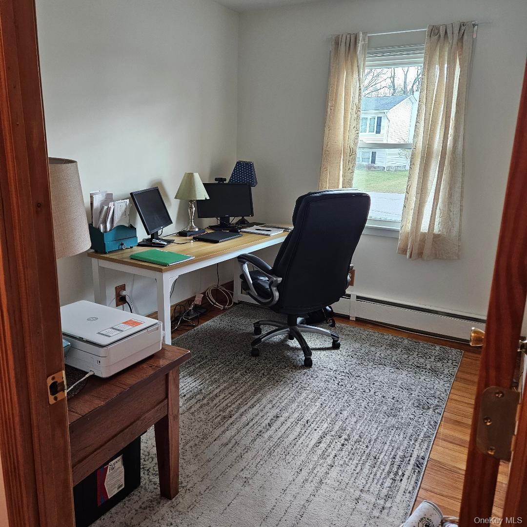 28 Cardinal Drive Poughkeepsie, NY 12601 - Photo 15 of 20 a view of a workspace with furniture and a window