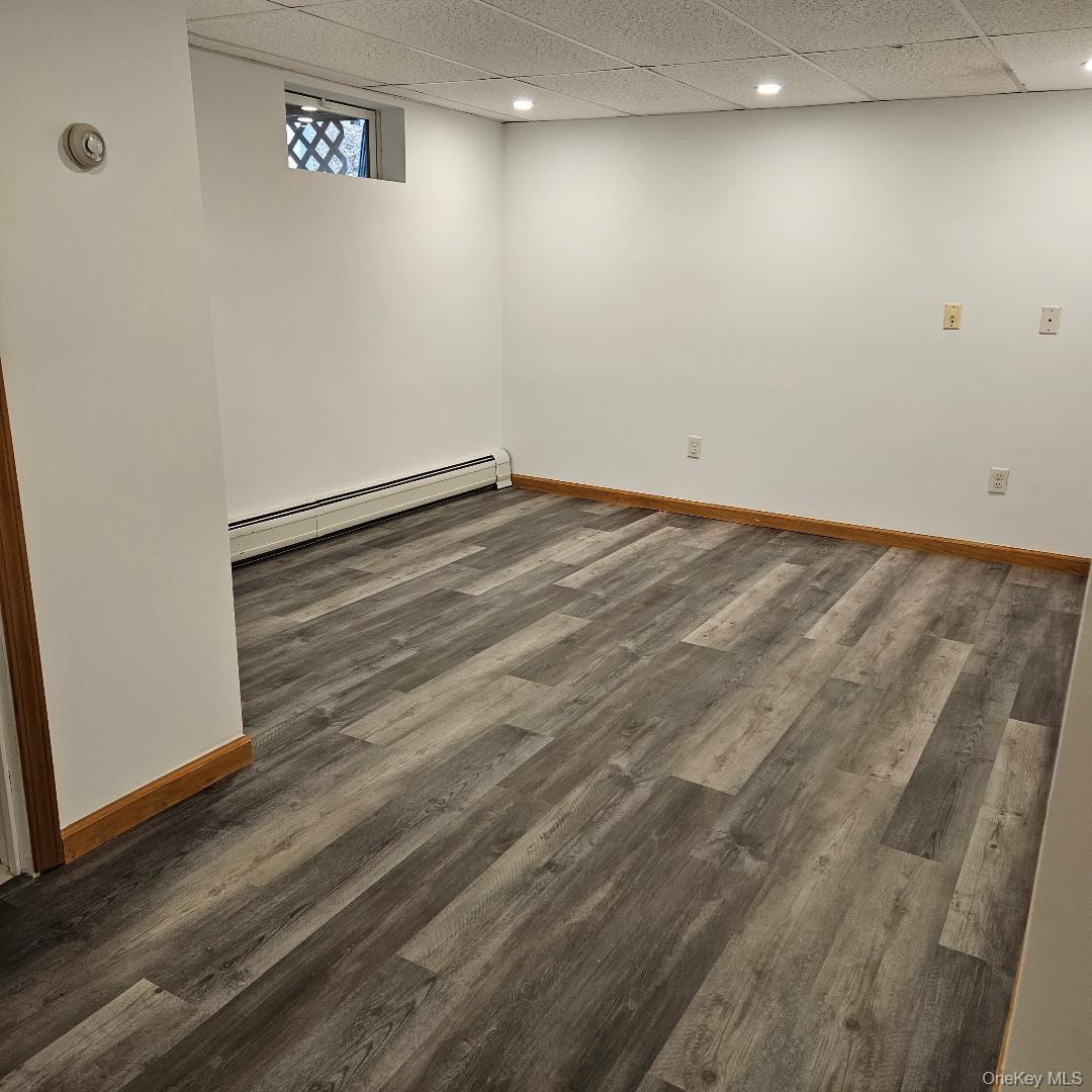 28 Cardinal Drive Poughkeepsie, NY 12601 - Photo 18 of 20 a view of empty room with wooden floor