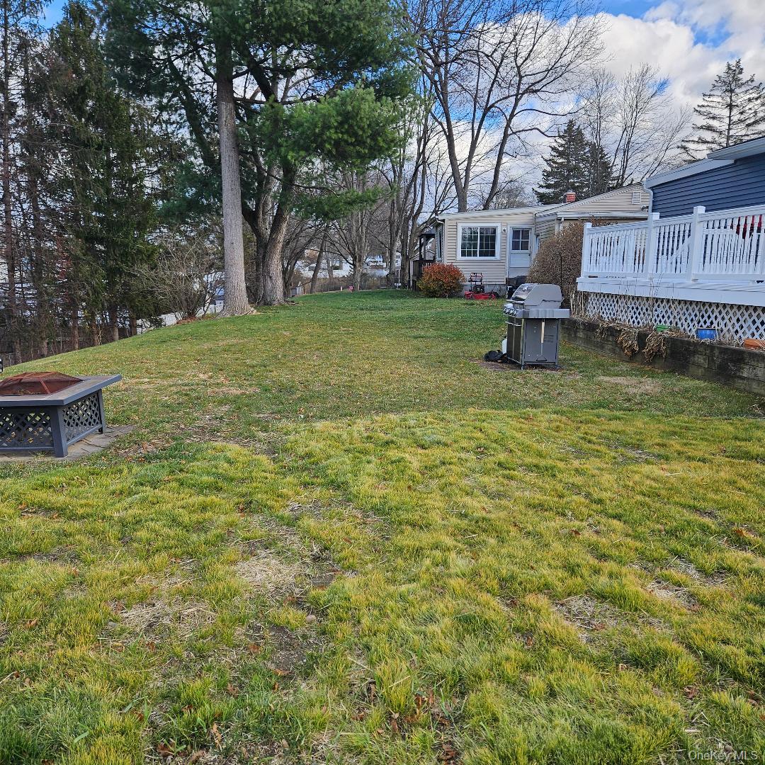 28 Cardinal Drive Poughkeepsie, NY 12601 - Photo 3 of 20 a view of a house with a yard