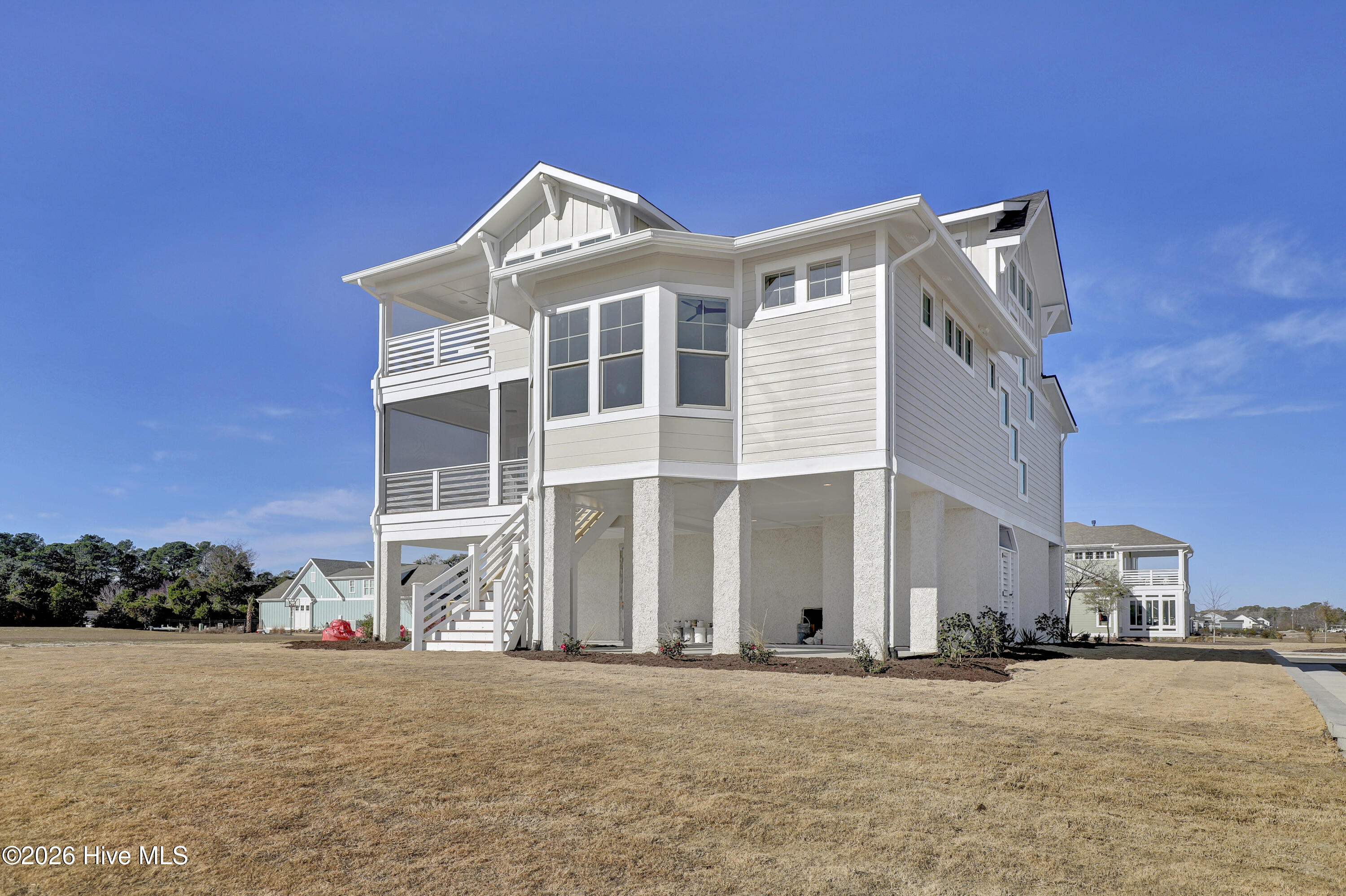 26 Solstice Way Hampstead, NC 28443 - Photo 3 of 49 Rear Exterior