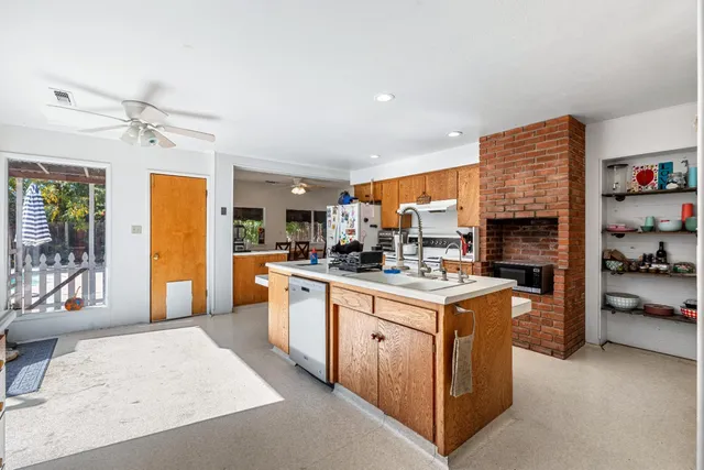 a bedroom with a bed and a desk