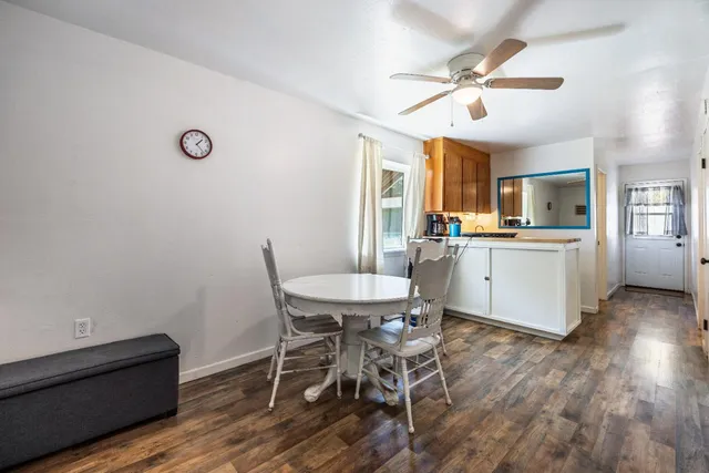an aerial view of a house with yard swimming pool and outdoor seating