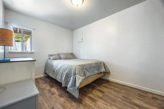 a kitchen with stainless steel appliances a stove a sink and a microwave