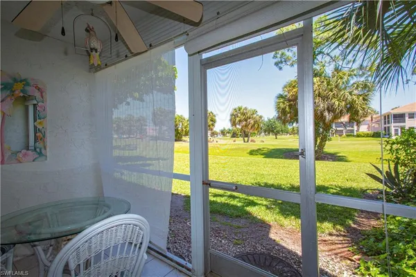 a view of a porch with furniture