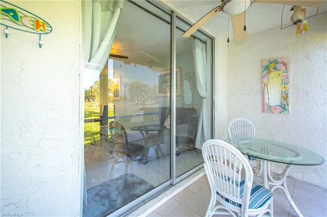a bathroom with a granite countertop shower a mirror and a sink