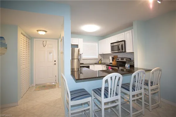 a view of a dining room with furniture