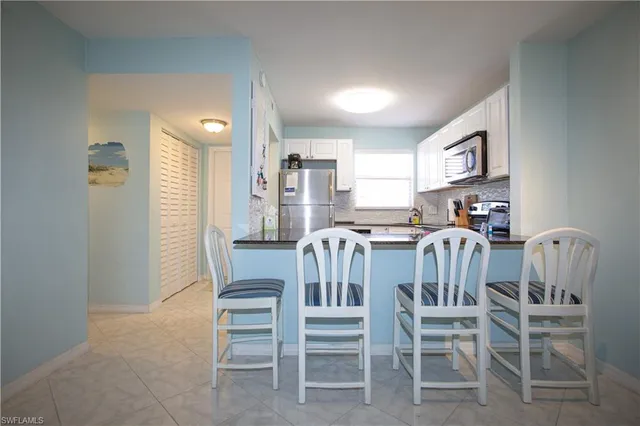 a view of a dining room with furniture