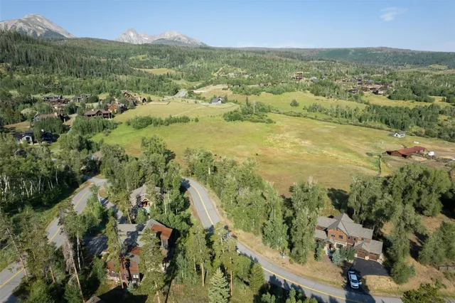 a view of an ocean and a mountain