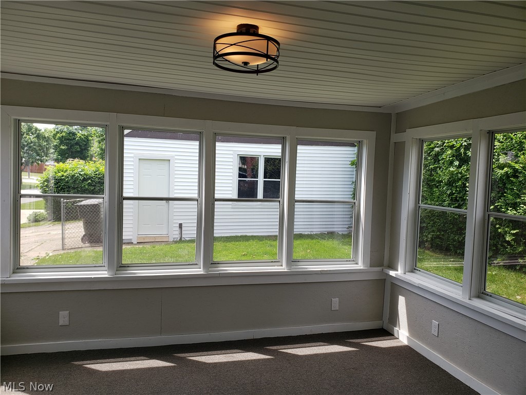 4082 Wilmington Road Cleveland, OH 44121 - Photo 7 of 35 3-Season Sun Porch off Kitchen