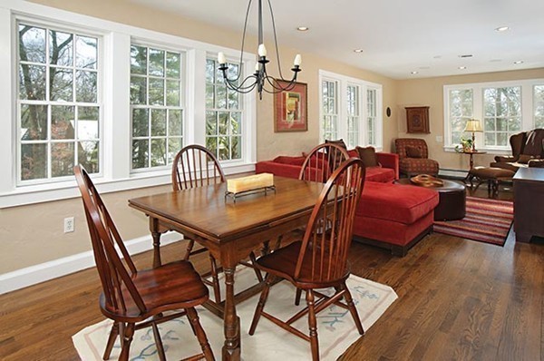 133 Collins Road Newton, MA 02468 - Photo 5 of 15 a view of a dining room with furniture window and wooden floor