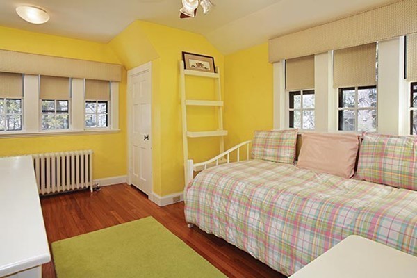 133 Collins Road Newton, MA 02468 - Photo 10 of 15 a bedroom with a bed and wooden floor