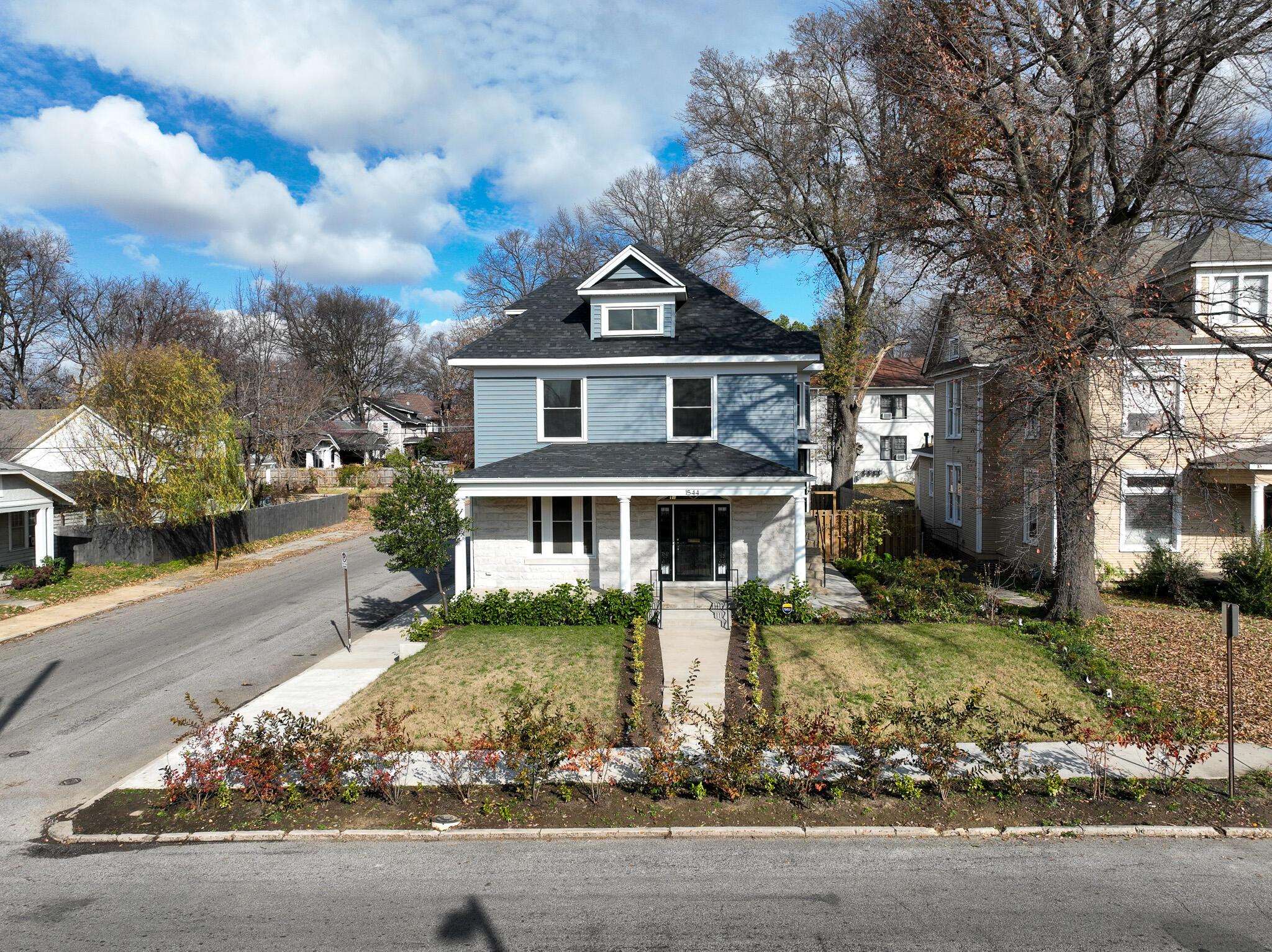 1544 Court Avenue, Unit 1 Memphis, TN 38104 - Photo 17 of 36 front view of a house with a yard