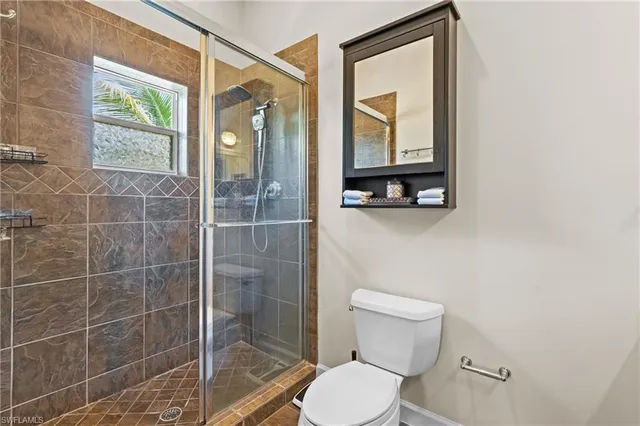 a bathroom with 2 sink and a mirror