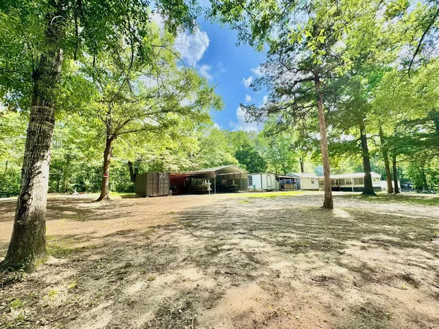 a house with trees in front of it