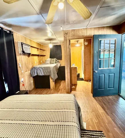 a bathroom with a double vanity sink and a shower