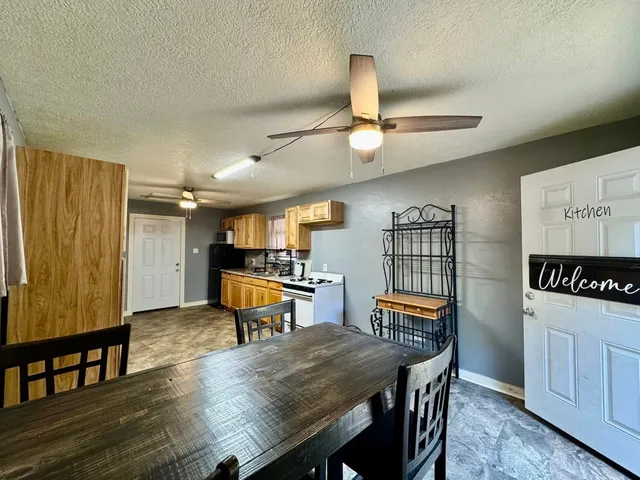 a view of a dining room with furniture