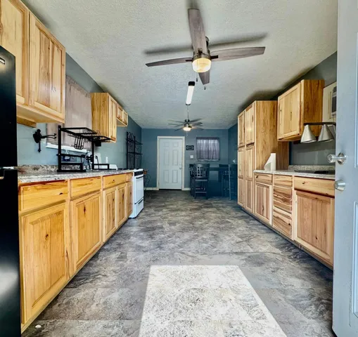 a living room with a table and a clock