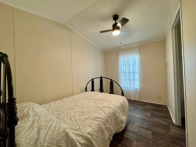 a bathroom with a sink toilet and mirror