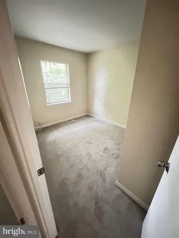 a view of a street with cars