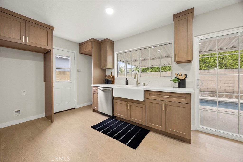 11524 Jerry Street Cerritos, CA 90703 - Photo 10 of 31 Window over the sink allows you to view the outdoors. Inside washer and dryer hook-ups make this chore easier.