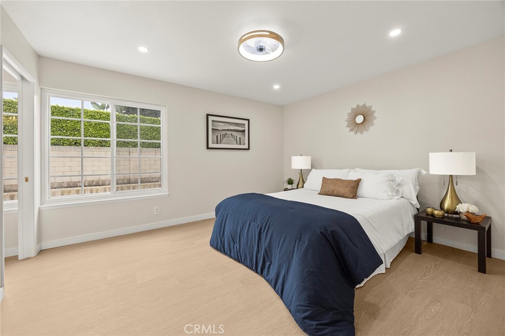 11524 Jerry Street Cerritos, CA 90703 - Photo 13 of 31 Life is "suite" in this primary bedroom. Primary bedroom has en suite bath.