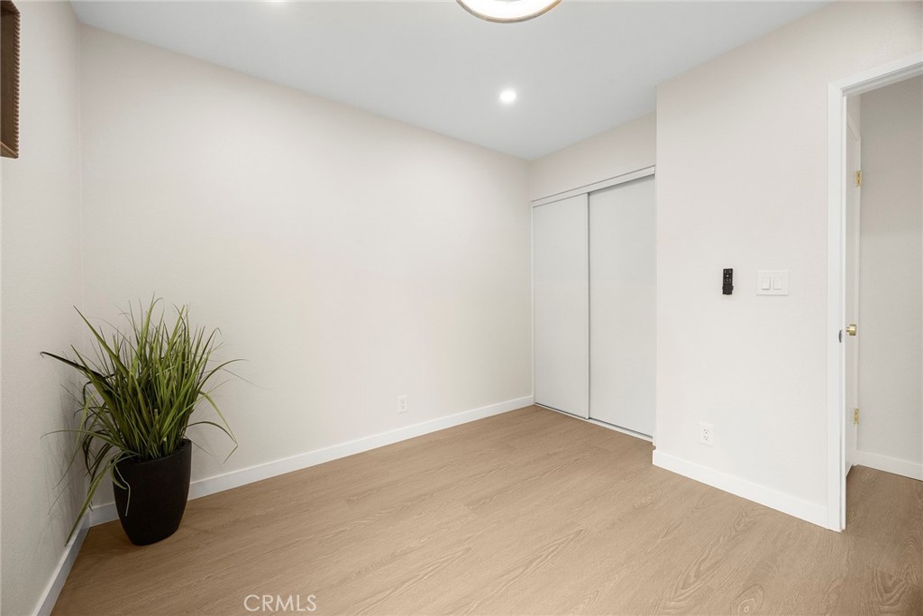 11524 Jerry Street Cerritos, CA 90703 - Photo 22 of 31 The primary bedroom has an en suite bath, while the secondary bedrooms share a full hall bath.