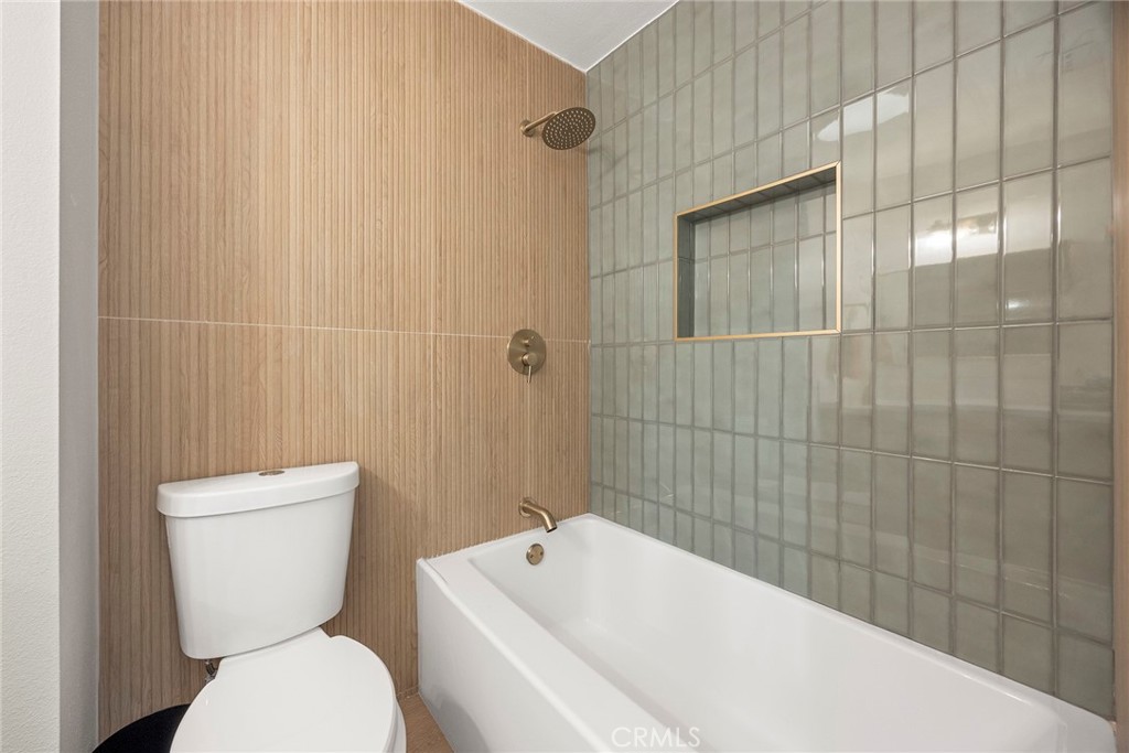 11524 Jerry Street Cerritos, CA 90703 - Photo 23 of 31 Full hall bath is newly remodeled with shower over tub combination.