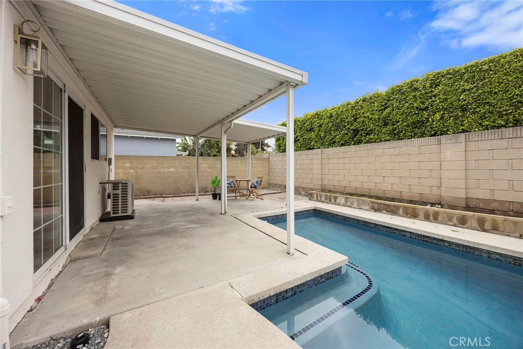 11524 Jerry Street Cerritos, CA 90703 - Photo 27 of 31 There is a charming covered patio that creates the perfect setting for relaxing or dining al fresco.