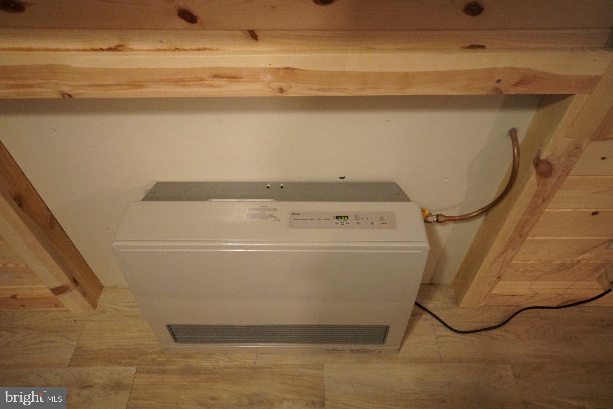 150 Sharp Ridge Lane Franklin, WV 26807 - Photo 47 of 69 Modern heating solution in cozy space.