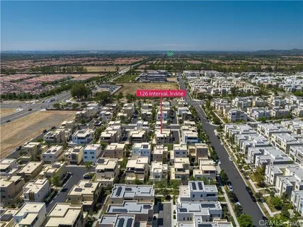 an aerial view of residential building and street