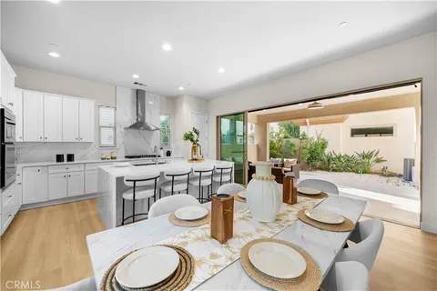 a bathroom with a shower sink and mirror