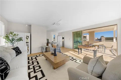 a swimming pool with outdoor seating and yard