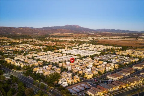 an aerial view of residential building with parking space